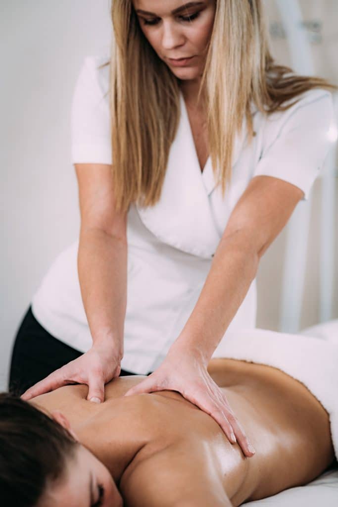 Licensed massage therapist giving a medical massage.